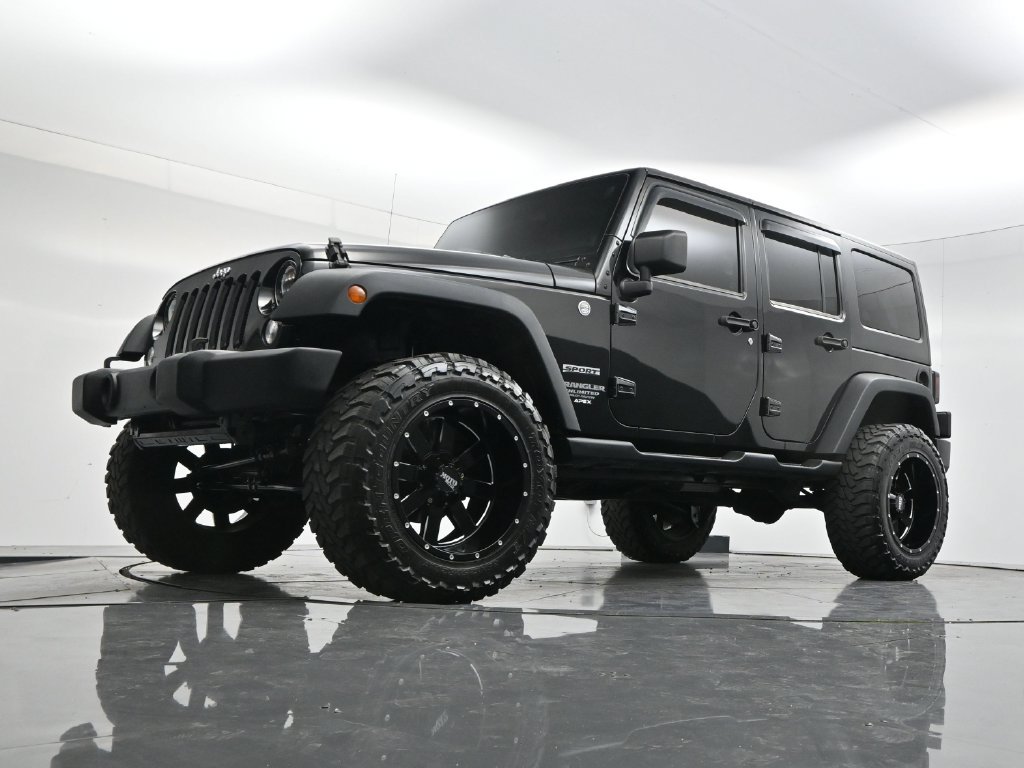 Used 2014 Black Clearcoat Jeep Unlimited Sport image 45