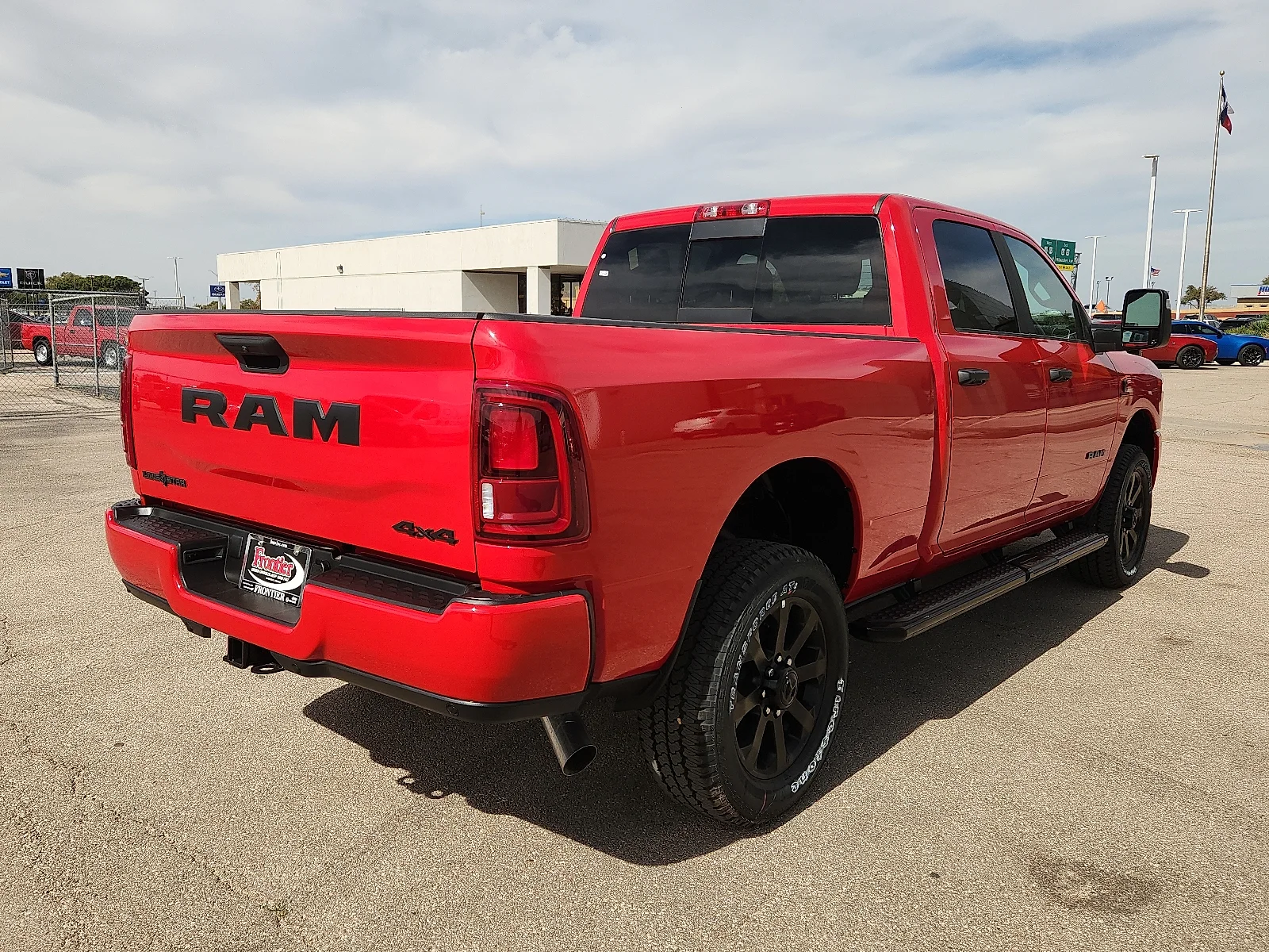 New 2027 Flame Red Clear-Coat  Paint Ram LONE STAR CREW CAB 4X4 6