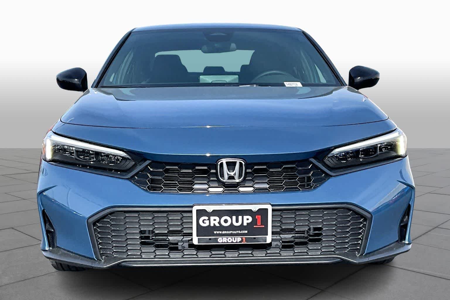 View vehicle photo 3