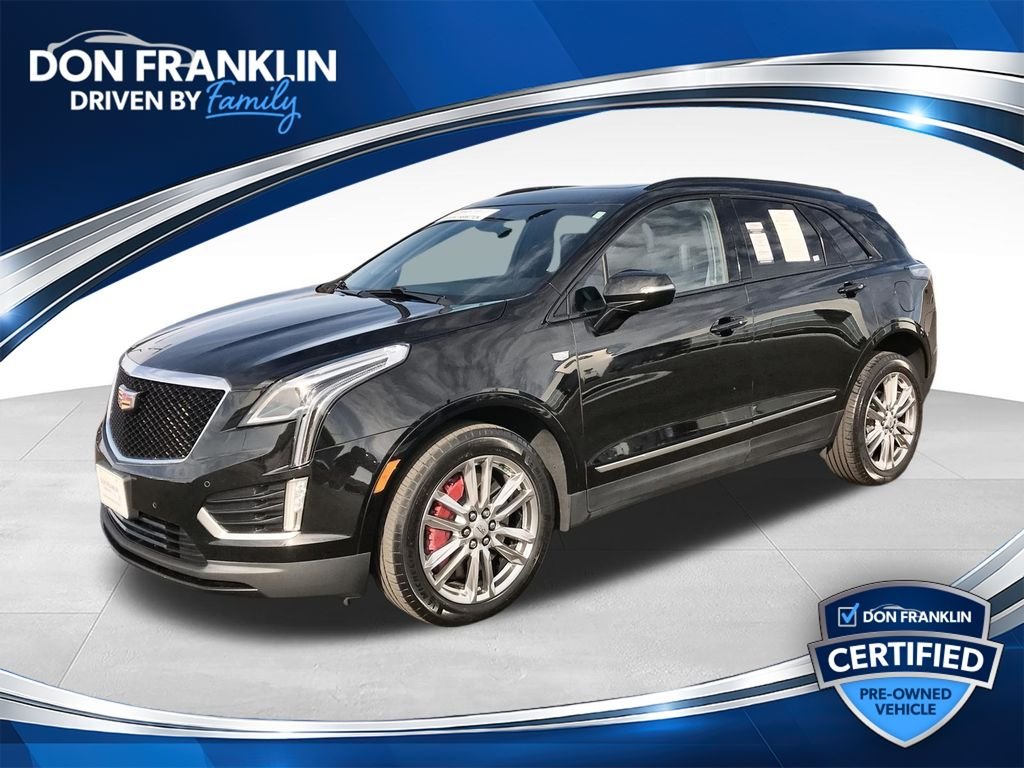 Used 2024 Black Cadillac Sport image 1