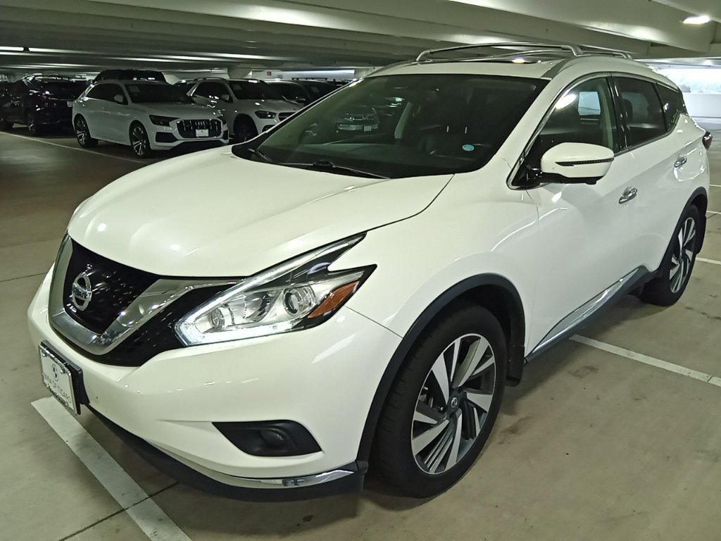 Used 2018 Pearl White Nissan Platinum image 1