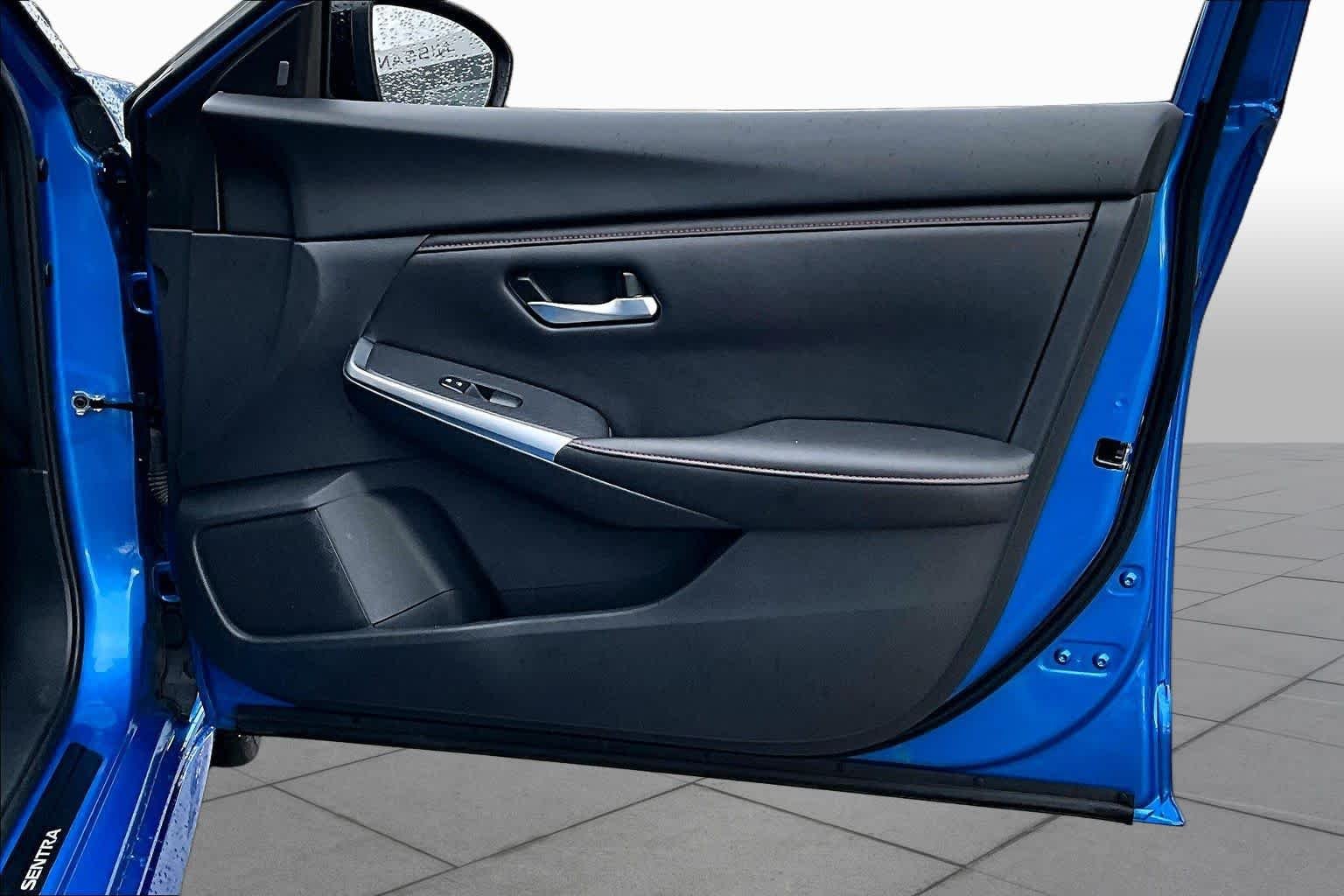 Used 2024 Electric Blue Metallic/Super Black Nissan SR image 23