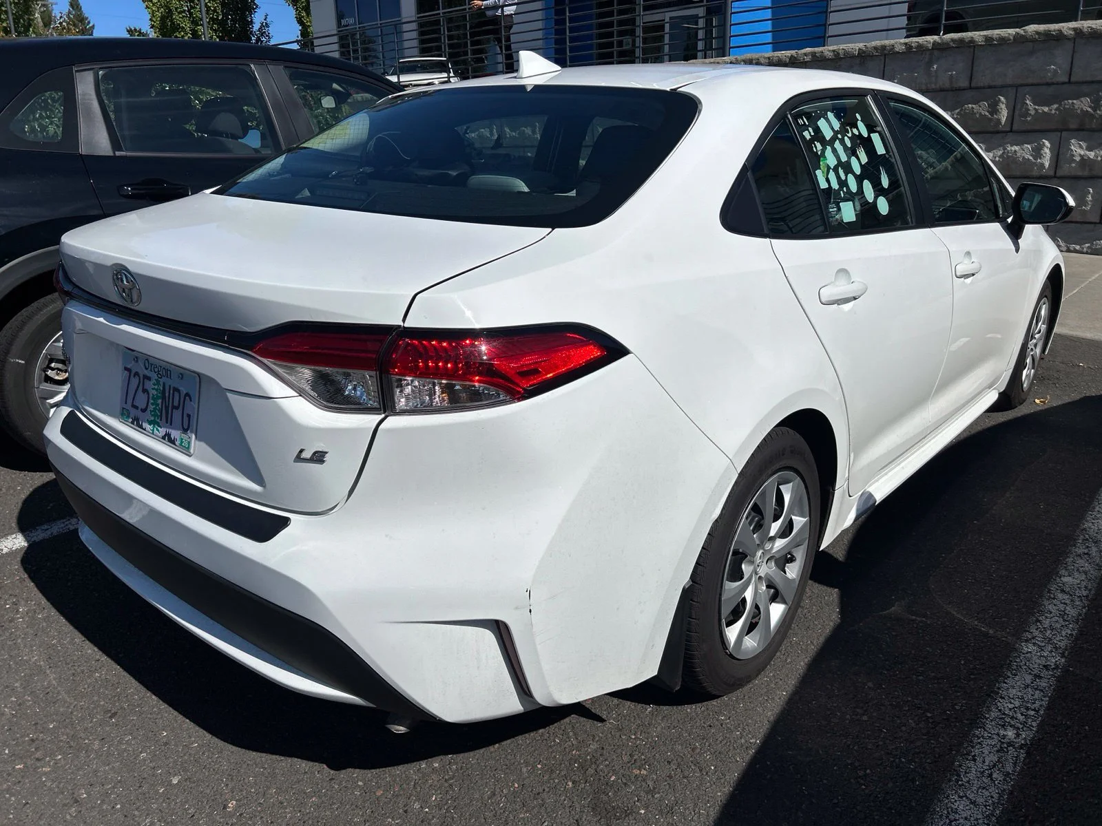 Used 2021 Super White Toyota LE image 5