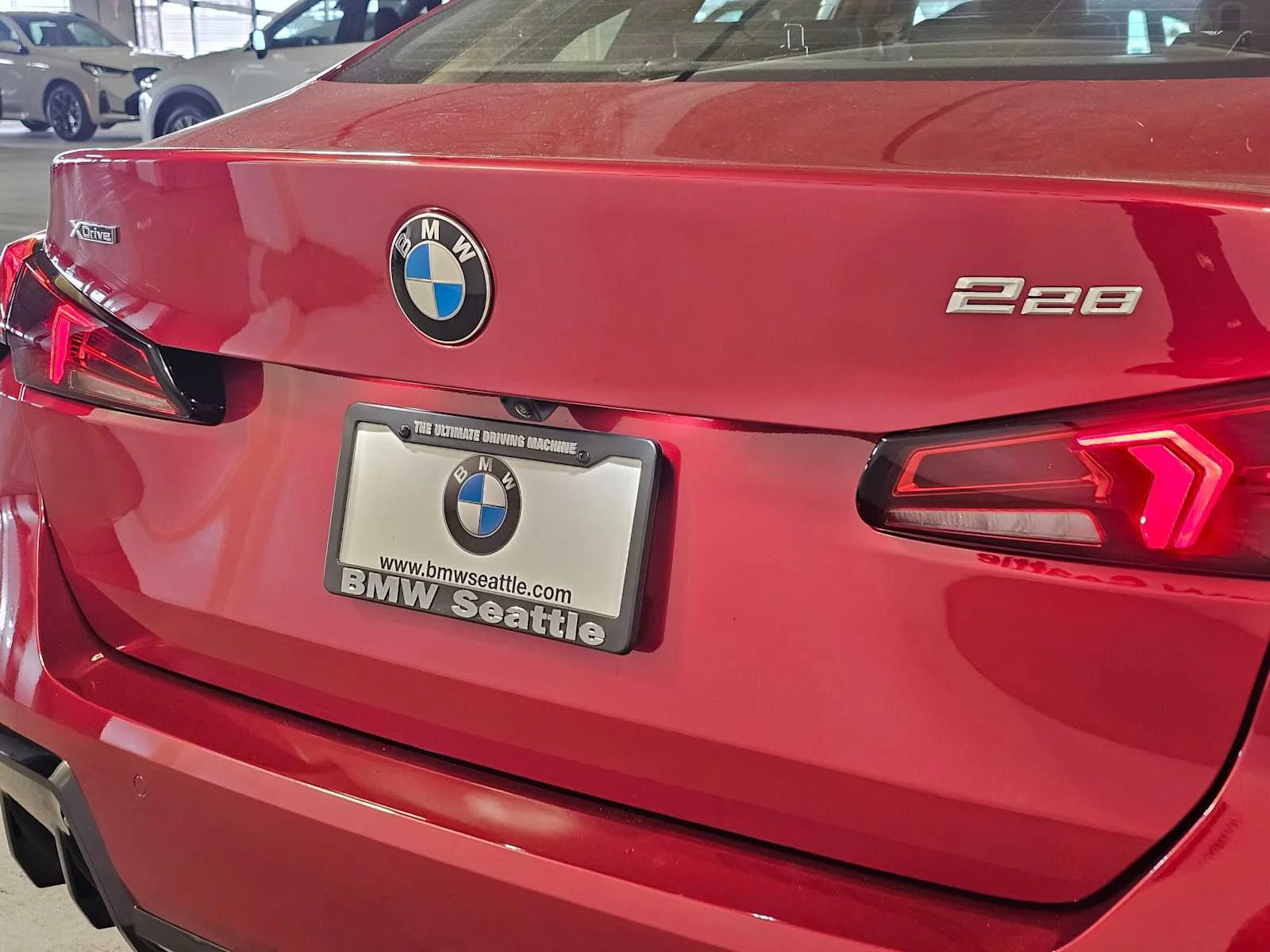 Certified Used 2025 Vegas Red Metallic BMW 228 xDrive image 6