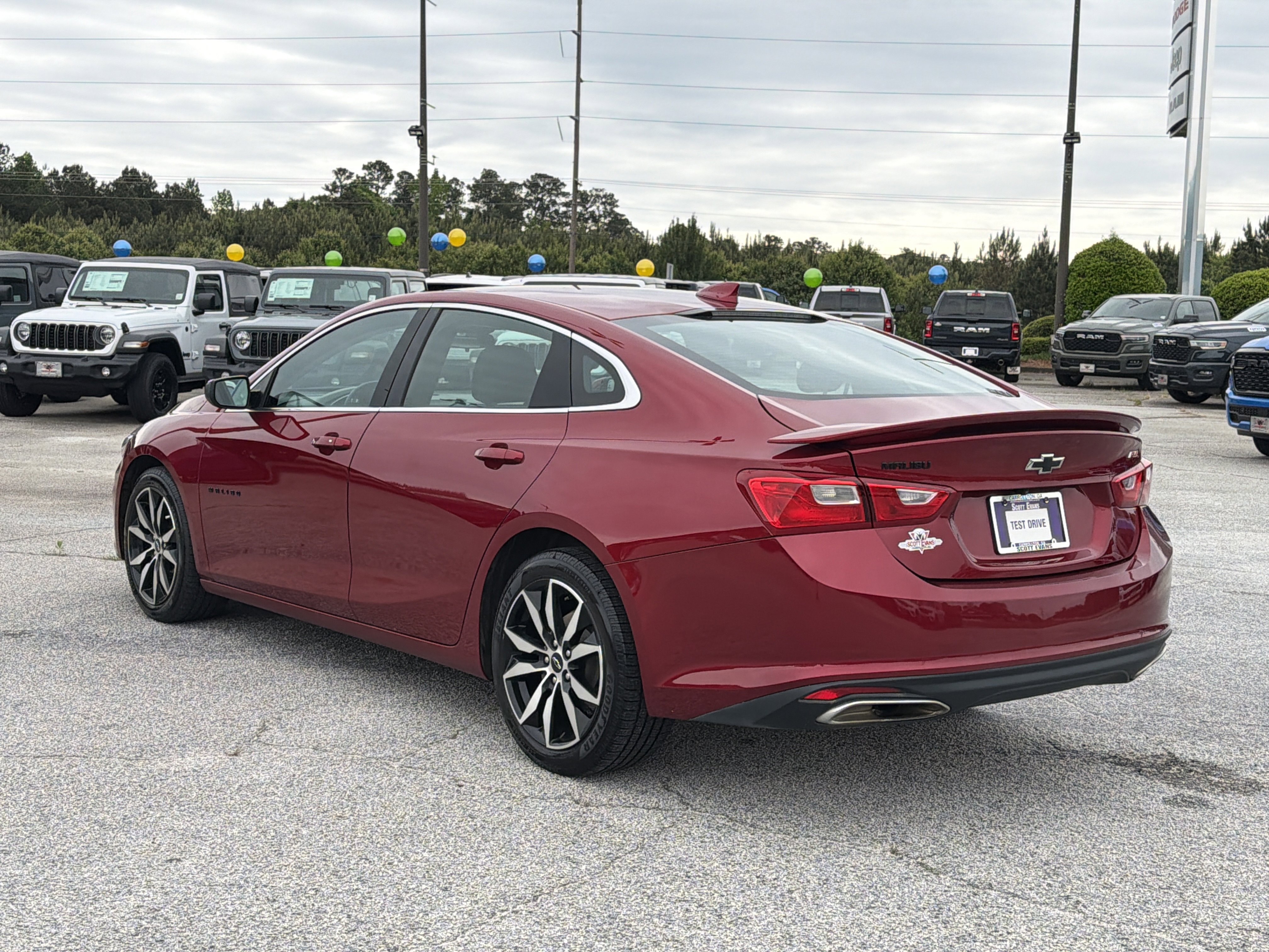 Used 2023 Radiant Red Tintcoat Chevrolet RS image 6