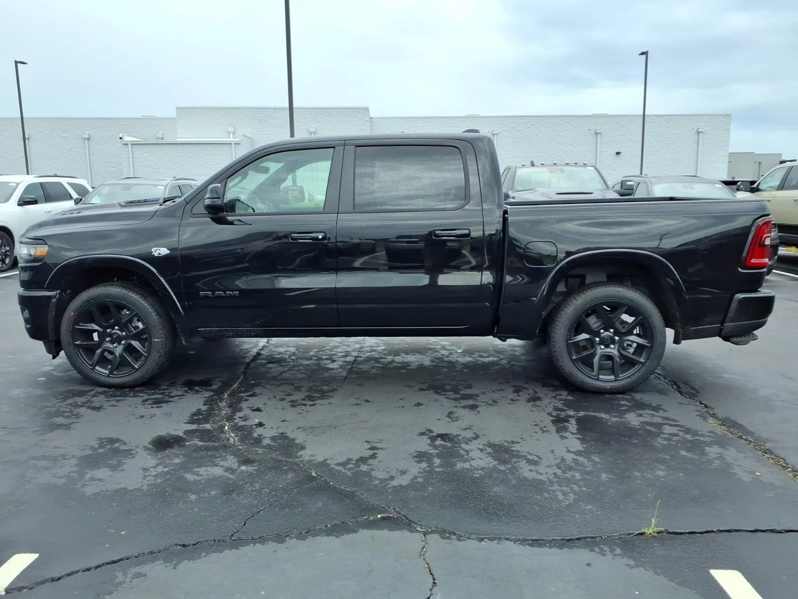 New 2026 Diamond Black Crystal Pearl-Coat Exterior Paint RAM Laramie image 3