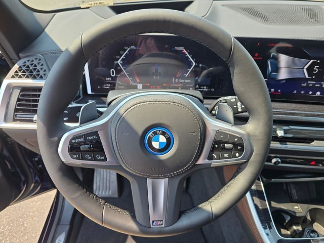 New 2026 Tanzanite Blue II Metallic BMW xDrive50e image 16