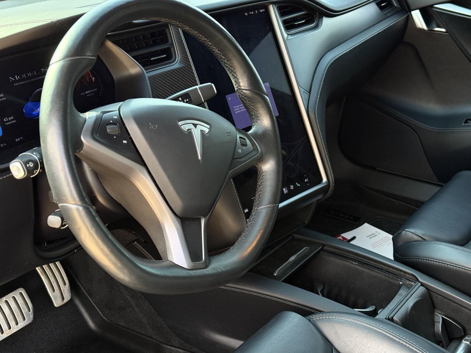 Used 2021 Solid Black Tesla Performance image 12