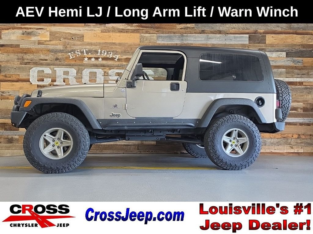Used 2004 Light Khaki Metallic Jeep Unlimited image 1