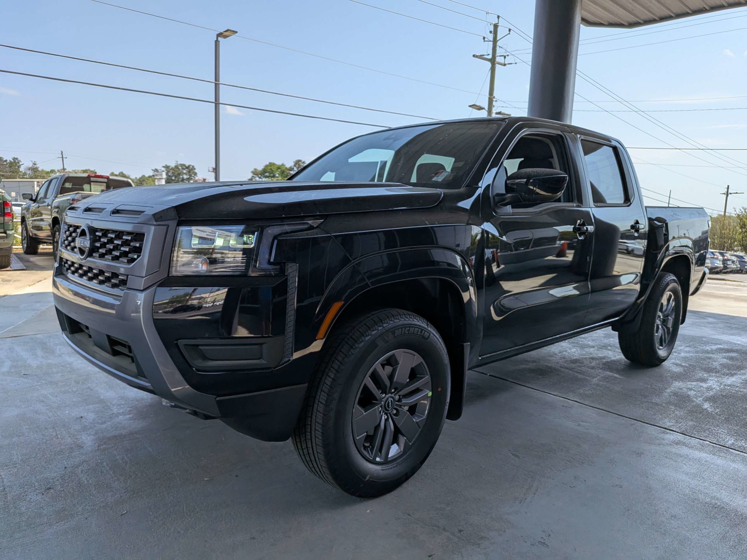 New 2026 Super Black Nissan Crew Cab SV image 7