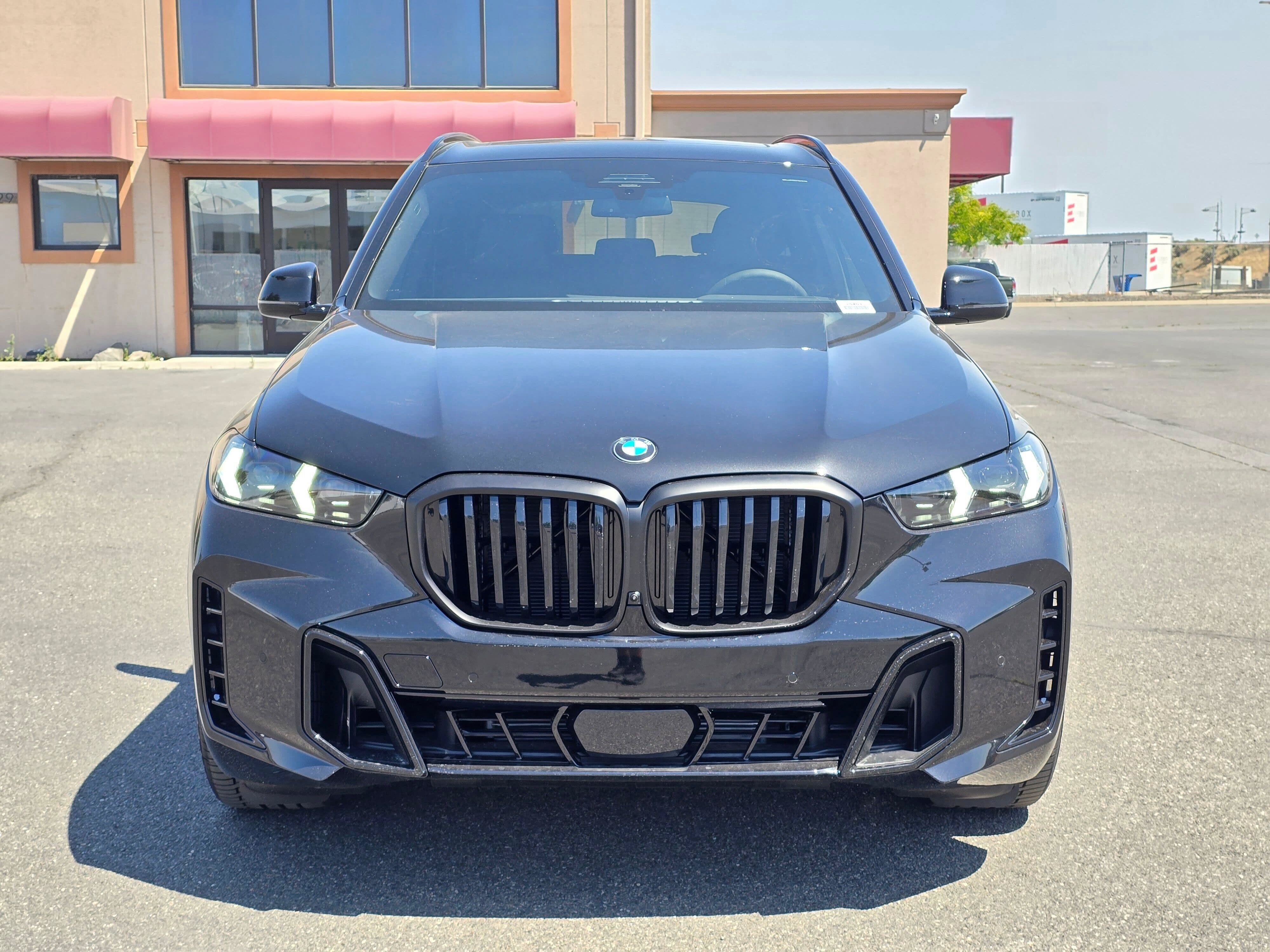 New 2026 Black Sapphire Metallic BMW xDrive40i image 6