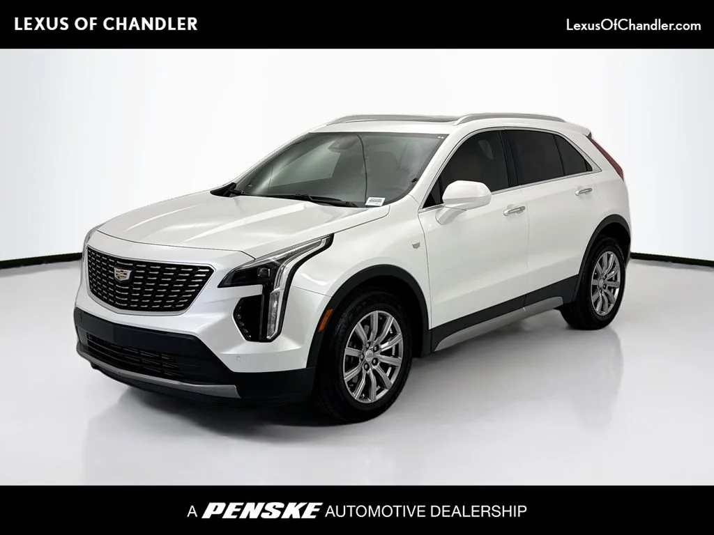 Used 2019 White Cadillac Premium Luxury image 1