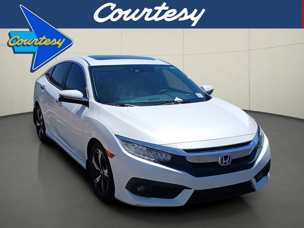 Used 2017 White Orchid Pearl Honda Touring image 1