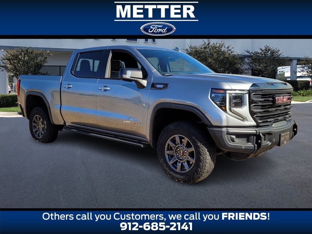 Used 2024 Silver GMC AT4X image 1