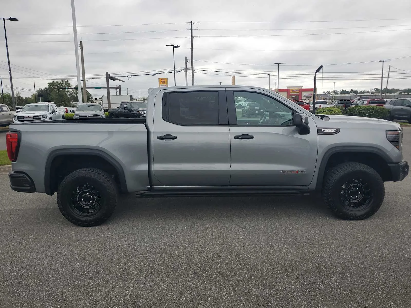 Used 2024 Sterling Metallic GMC AT4X image 7