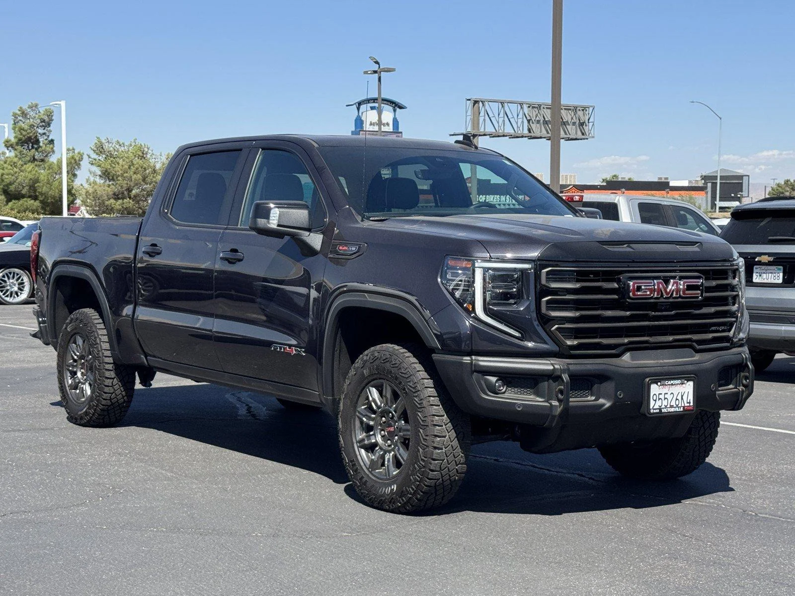 New 2026 TITANIUM RUSH METALLIC GMC AT4X image 1