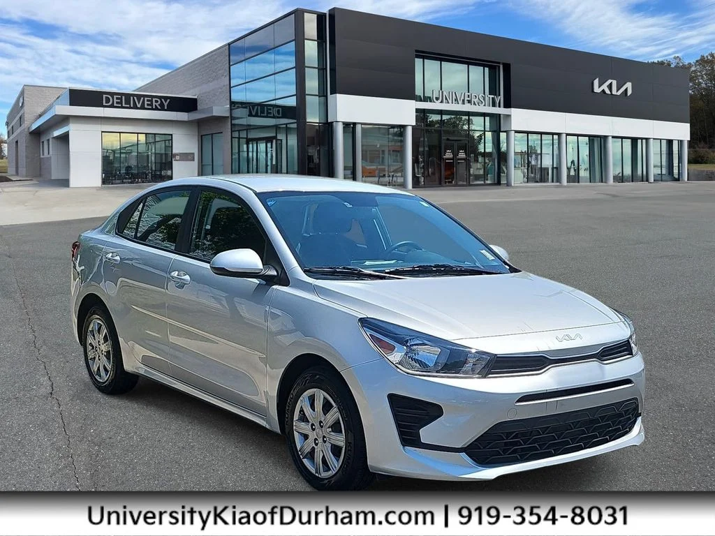 Used 2023 Silver Kia LX image 1