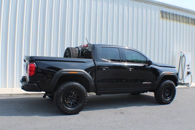 Used 2024 Onyx Black GMC 4WD AT4X image 2