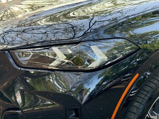 New 2026 Black Sapphire Metallic BMW xDrive50e image 9