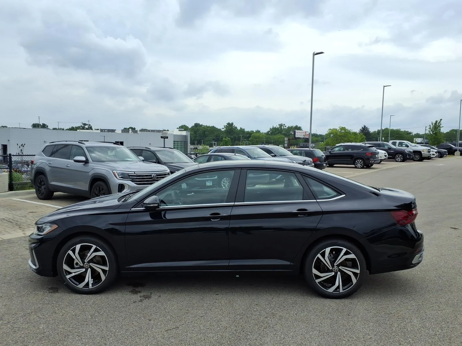 New 2026 Deep Black Pearl Volkswagen SEL AUTO image 4