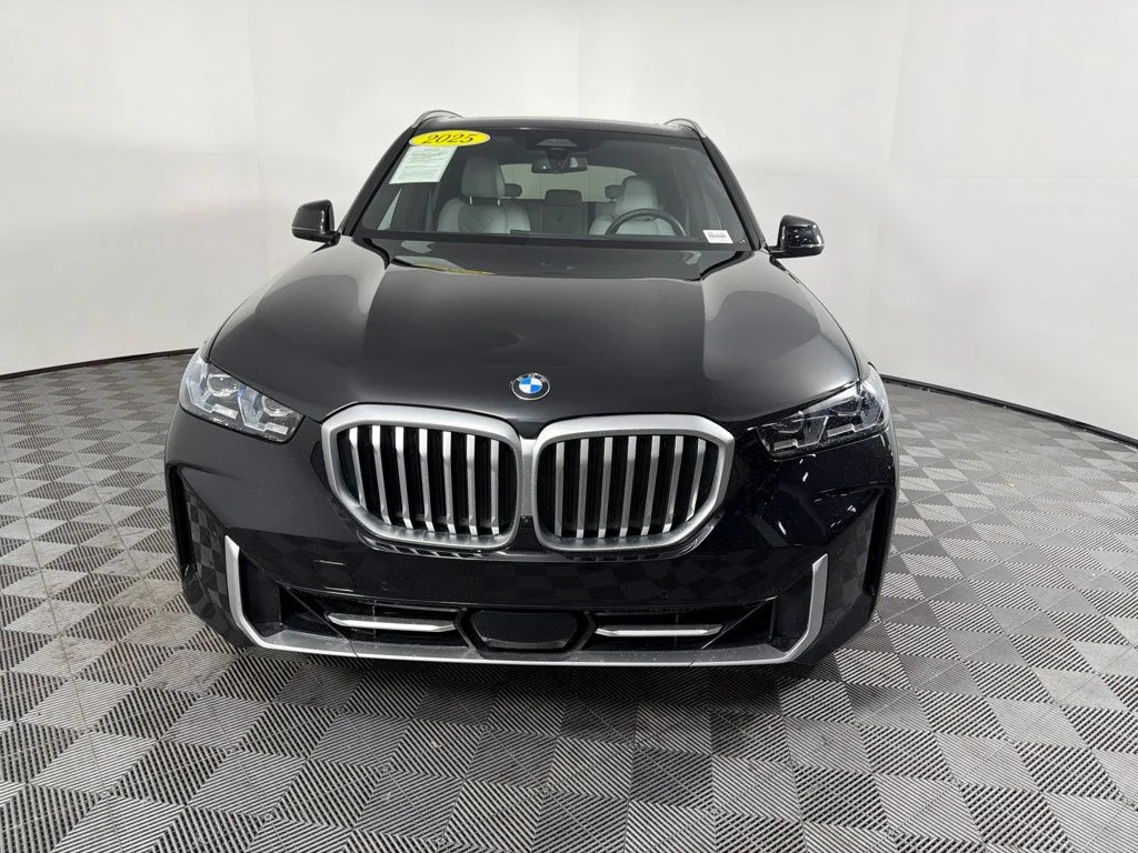 Certified Used 2025 Black Sapphire Metallic BMW xDrive40i image 2