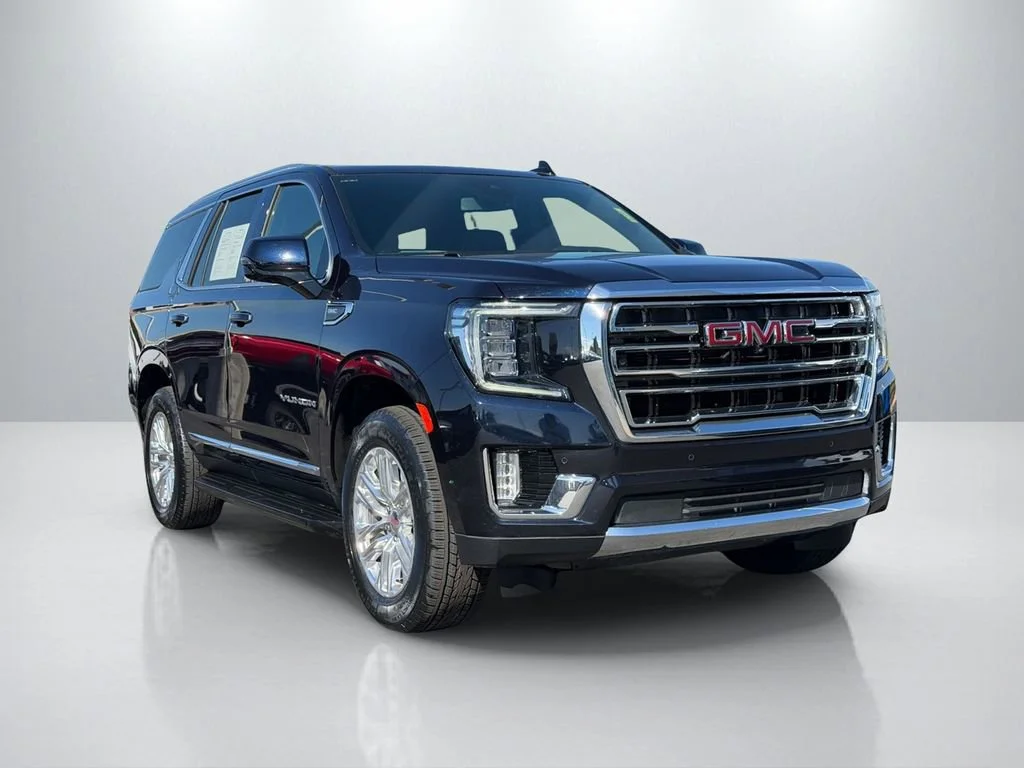 Used 2024 Midnight Blue Metallic GMC SLT image 1