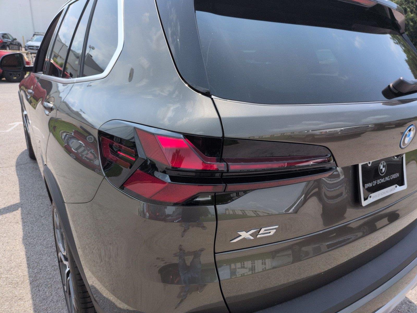 New 2026 Manhattan Green Metallic BMW xDrive50e image 12