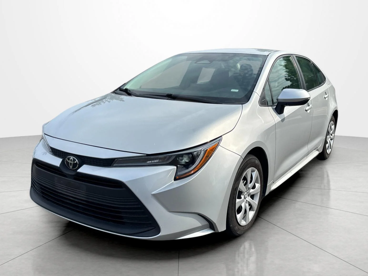 Used 2024 Classic Silver Metallic Toyota LE image 1