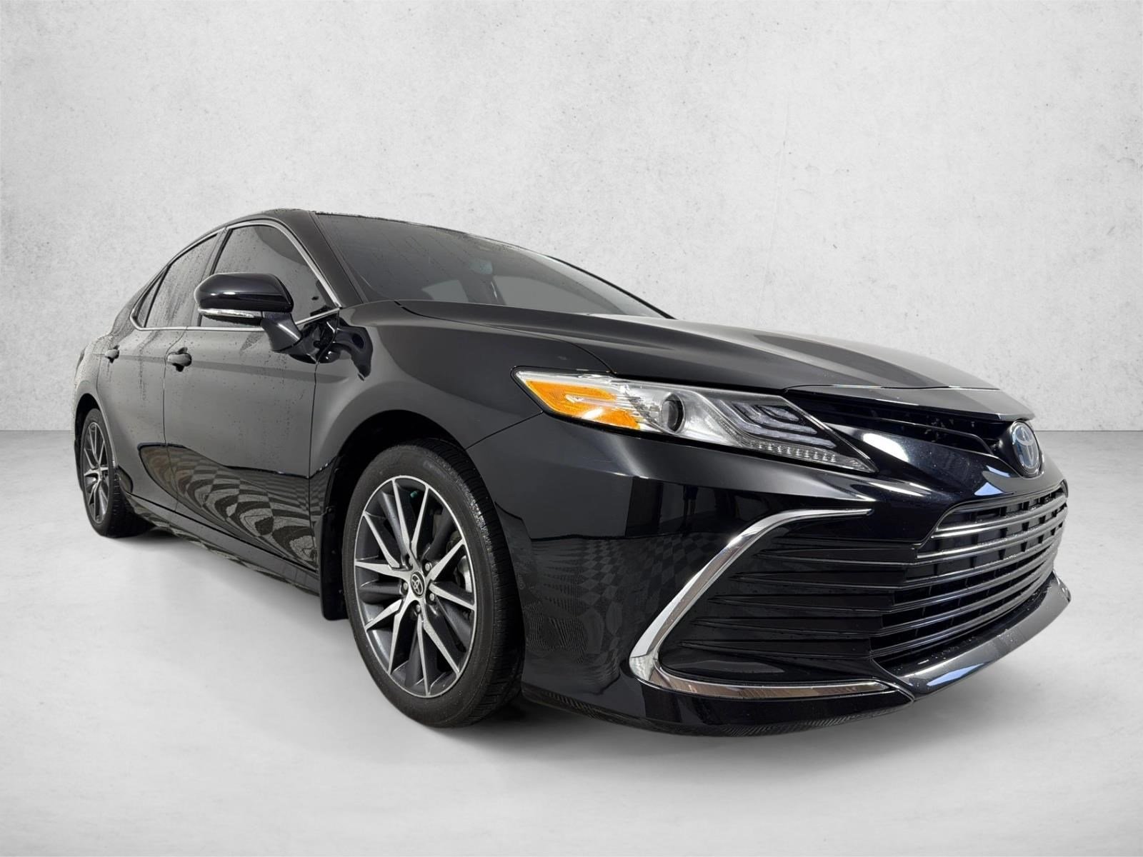 Used 2024 Midnight Black Metallic Toyota Hybrid XLE image 1