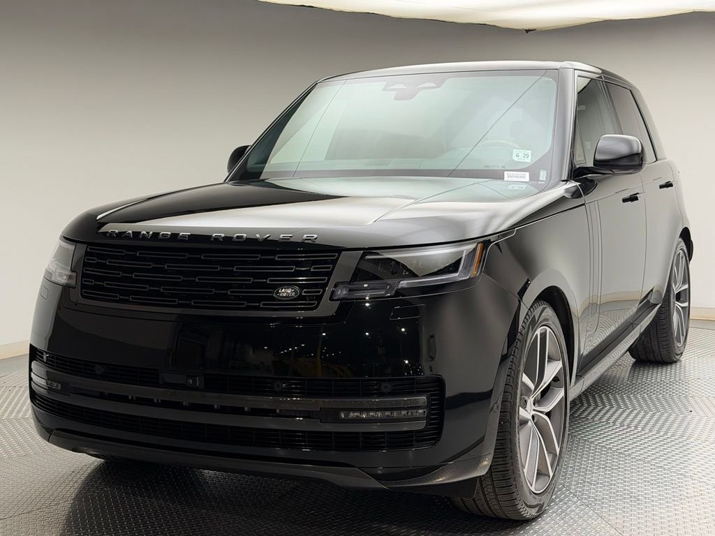 Used 2024 Santorini Black Metallic Land Rover SE image 1