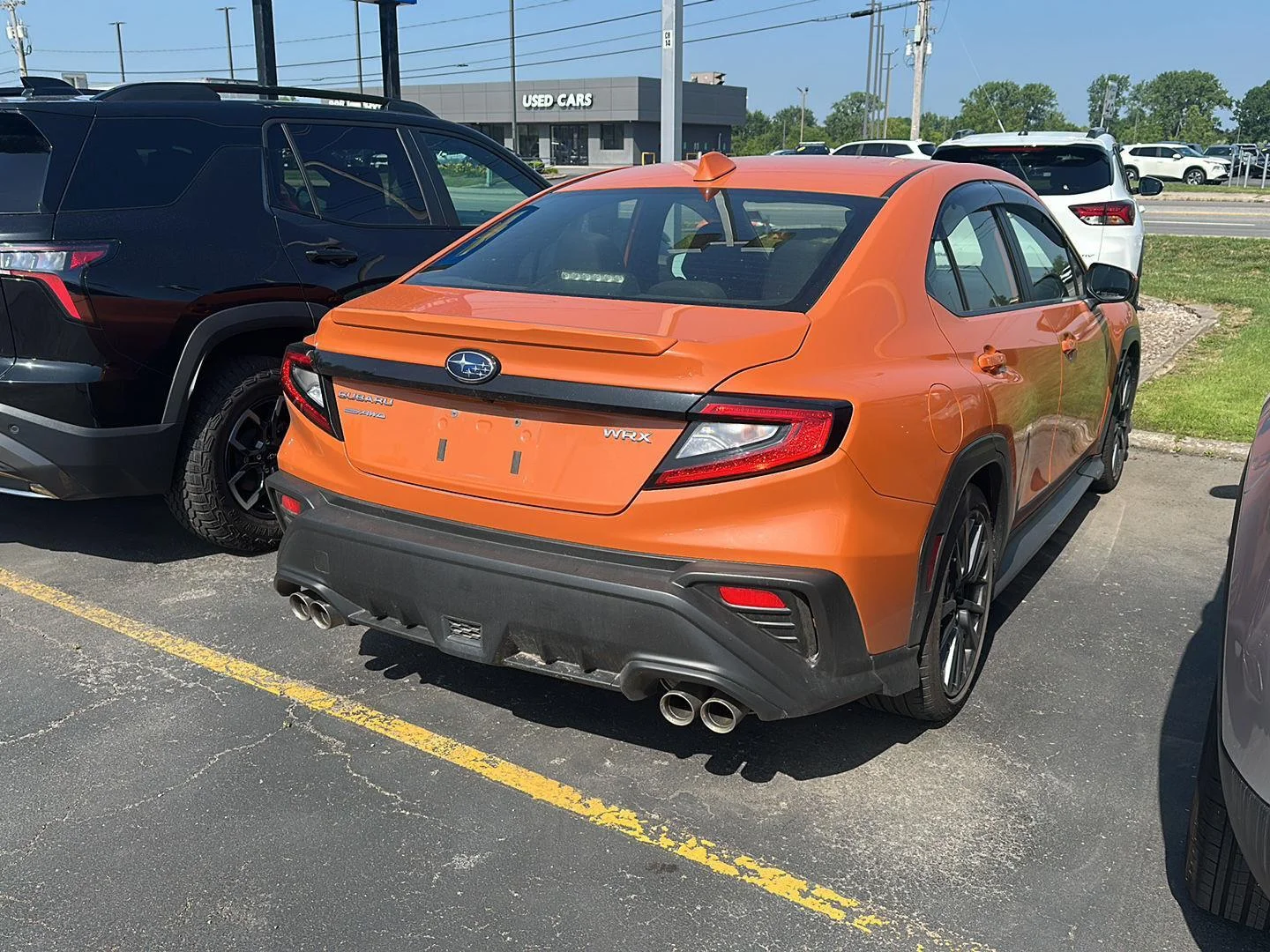 Used 2024 Solar Orange Pearl Subaru Premium image 2