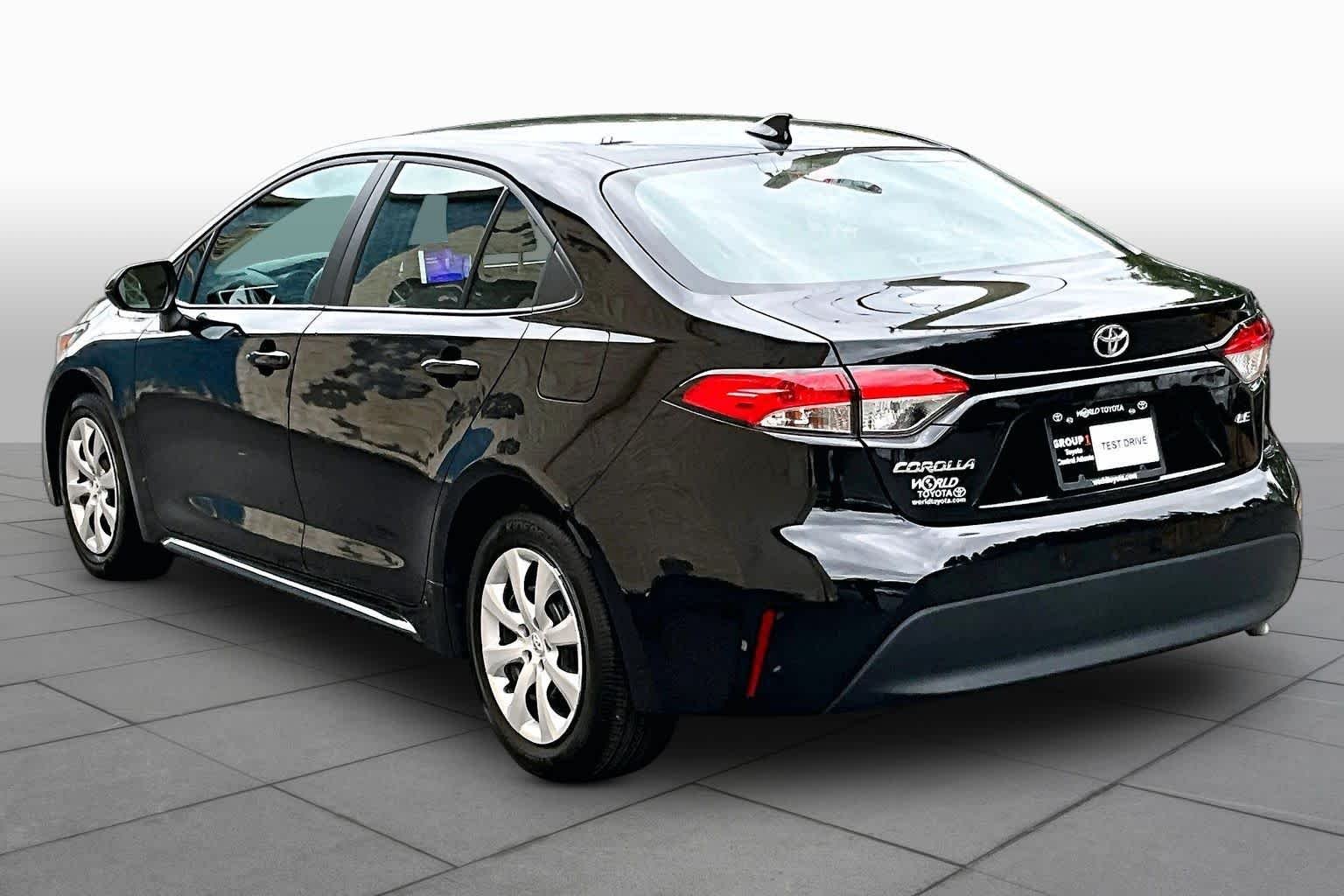Used 2025 Midnight Black Metallic Toyota LE image 12