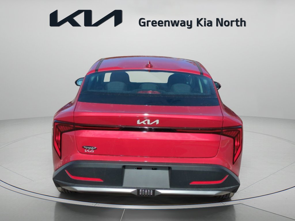 New 2026 Currant Red Kia LXS image 7