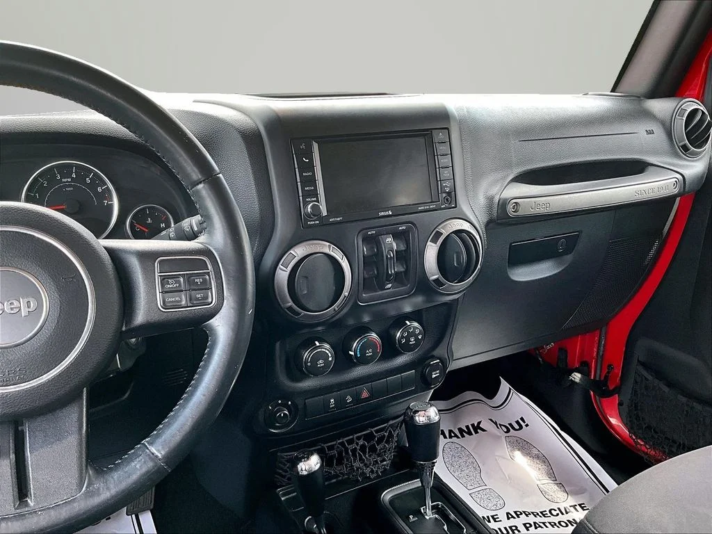 Used 2015 Red Jeep Unlimited Sport image 6