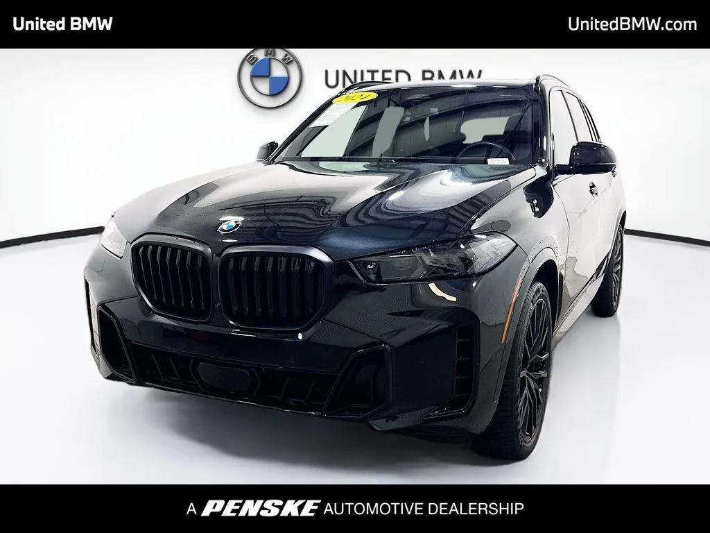 Certified Used 2024 Black Sapphire Metallic BMW xDrive40i image 1