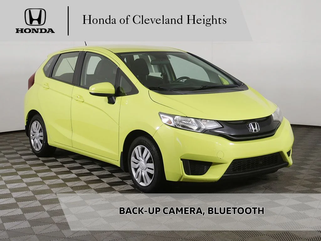 Used 2016 Mystic Yellow Pearl Honda LX image 1