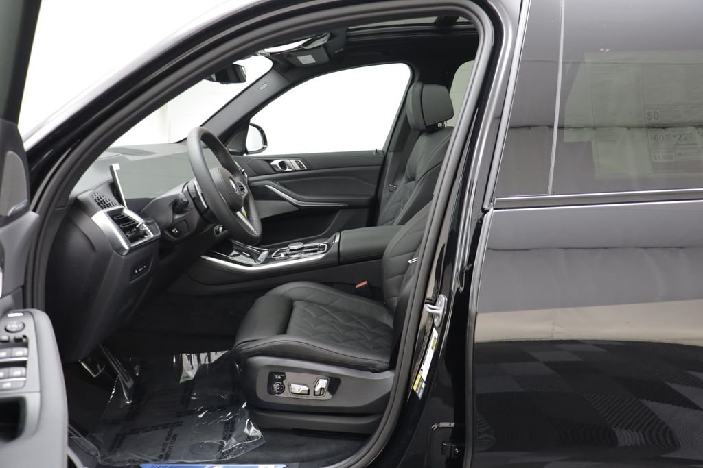 New 2026 Black Sapphire Metallic BMW xDrive50e image 7