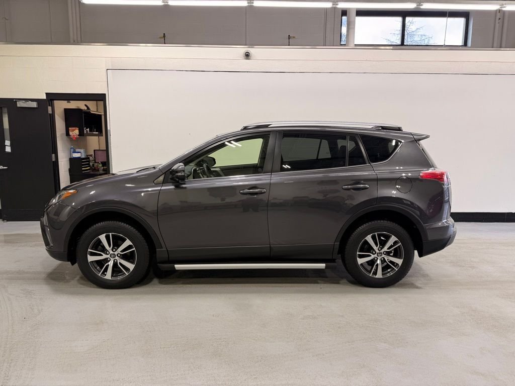 Used 2018 Toyota RAV4 XLE with VIN JTMRFREV6JJ231883 for sale in Golden Valley, Minnesota