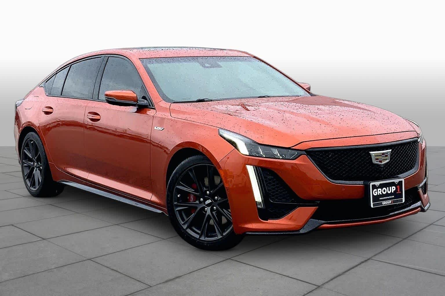 Used 2023 Blaze Orange Metallic Cadillac  image 3