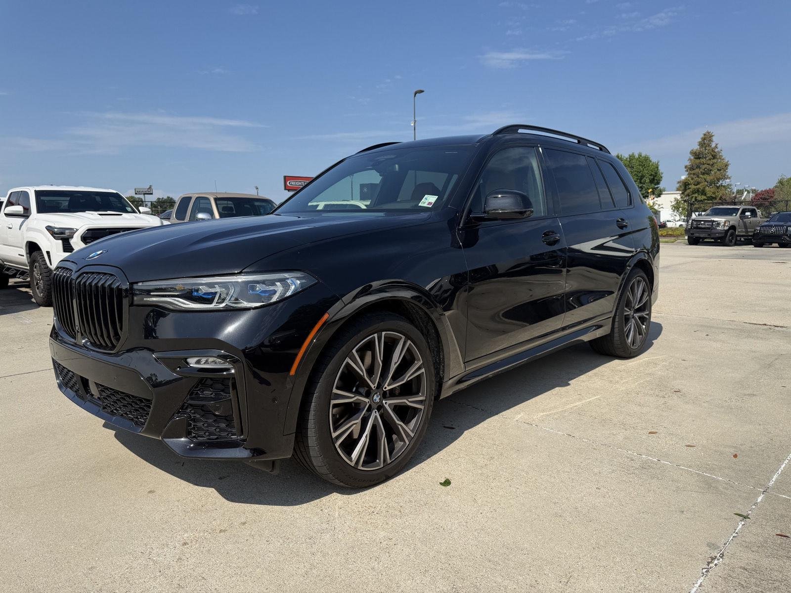 Used 2021 Black Sapphire Metallic BMW M50i image 3