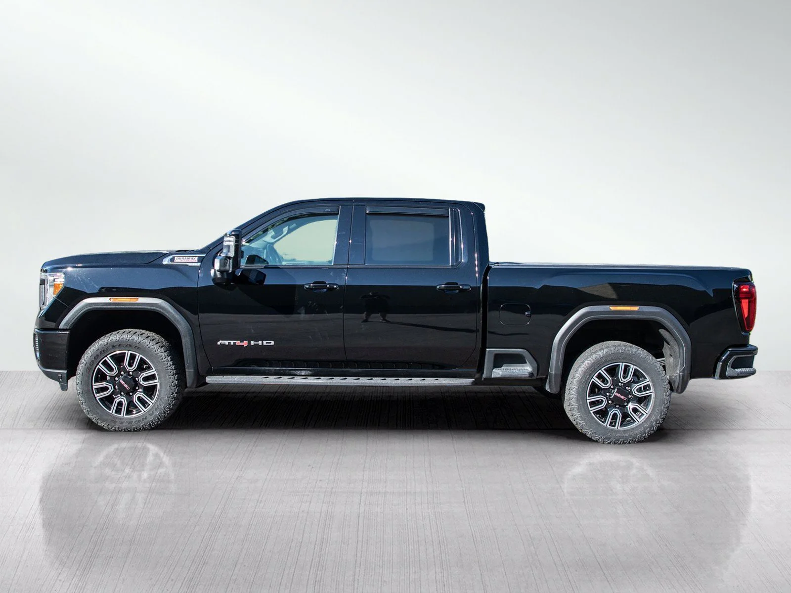 Used 2021 GMC Sierra 3500HD AT4 with VIN 1GT49VEY3MF142512 for sale in Roseville, Minnesota