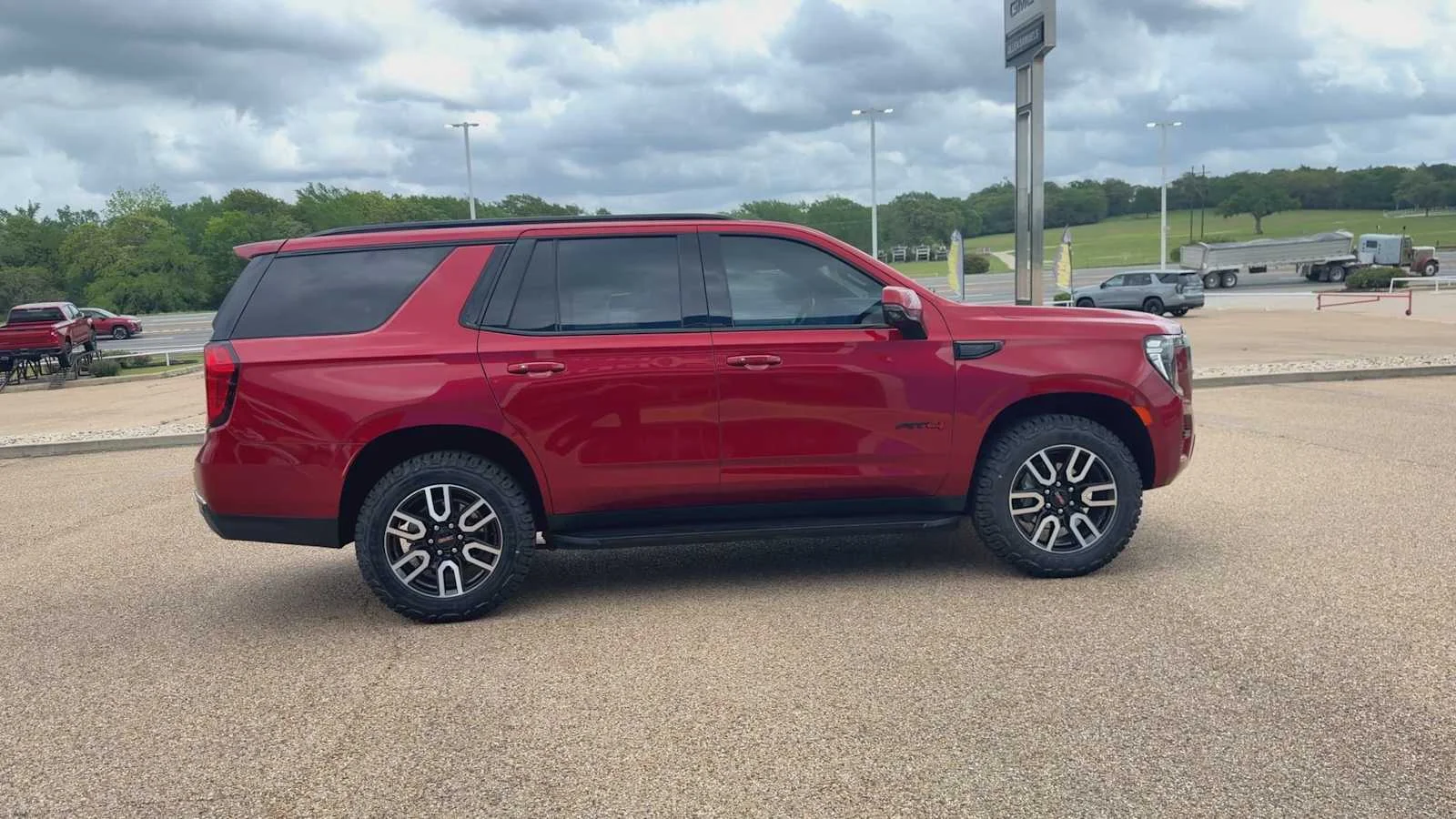 Used 2024 Volcanic Red Tintcoat GMC AT4 image 9