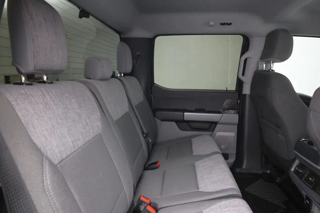Used 2025 Carbonized Gray Metallic Ford XLT 4WD Crew Cab 6.75