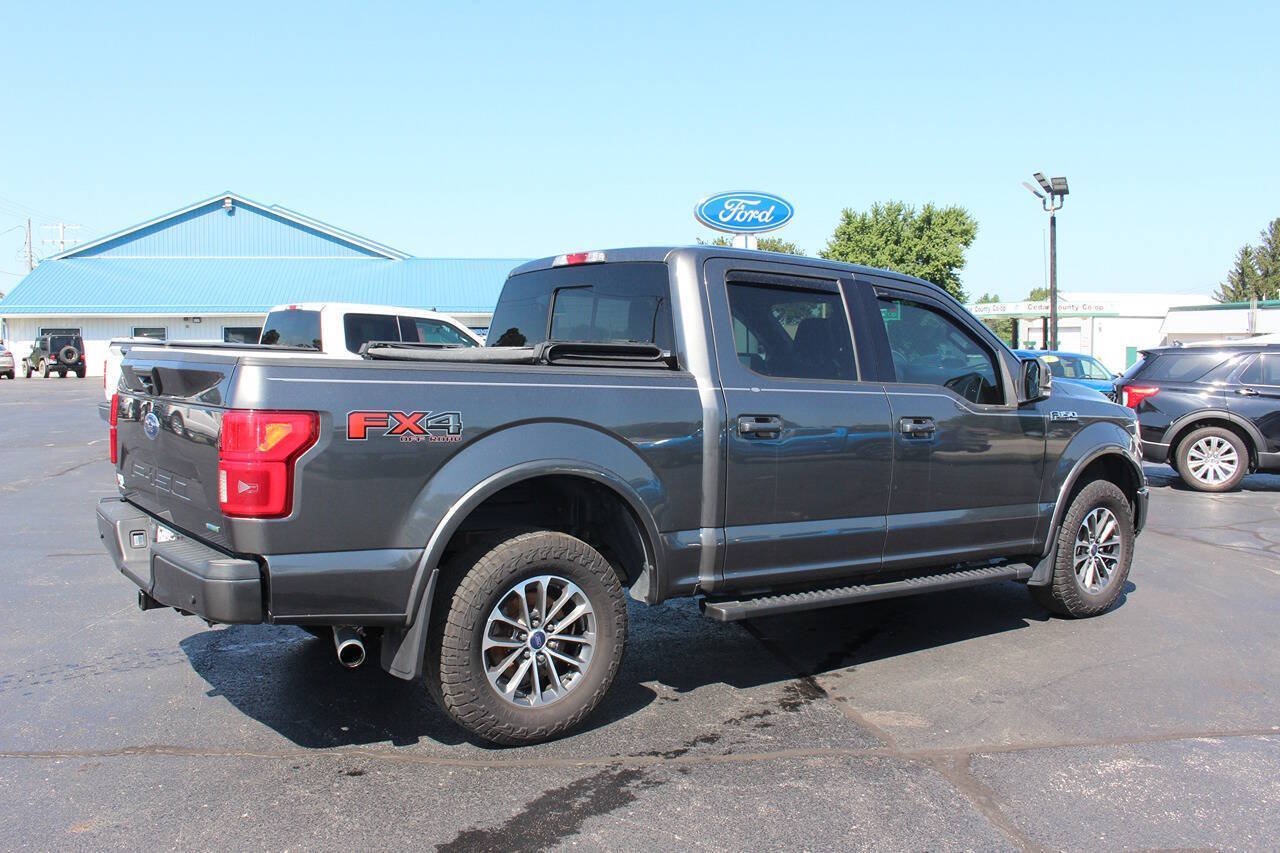 Used 2018 Magnetic Ford Lariat 4x4 4dr SuperCrew 5.5 ft. SB image 4
