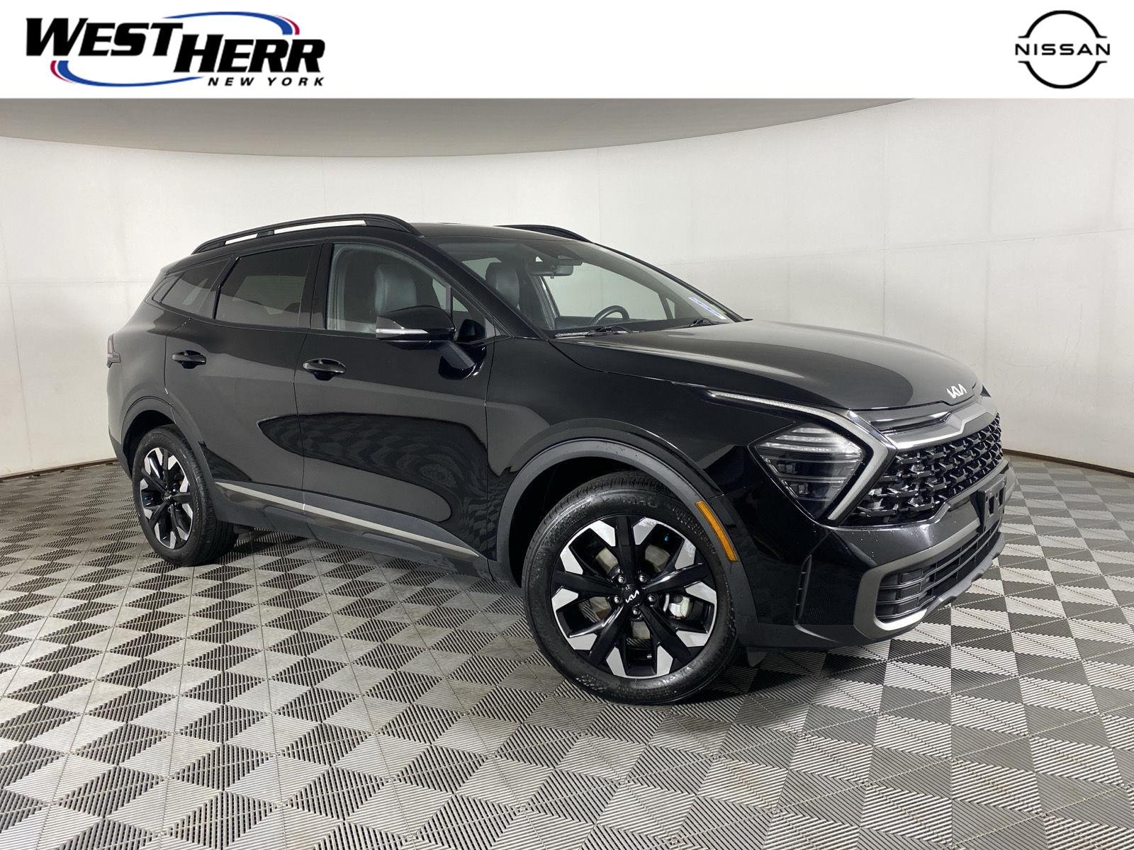 Used 2024 Ebony Black Kia X-Line image 1