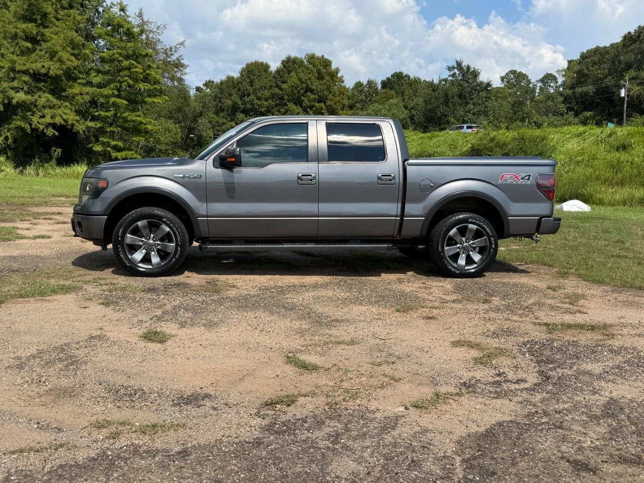 Used 2013 Gray Ford FX4 4x4 4dr SuperCrew Styleside 5.5 ft. SB image 2