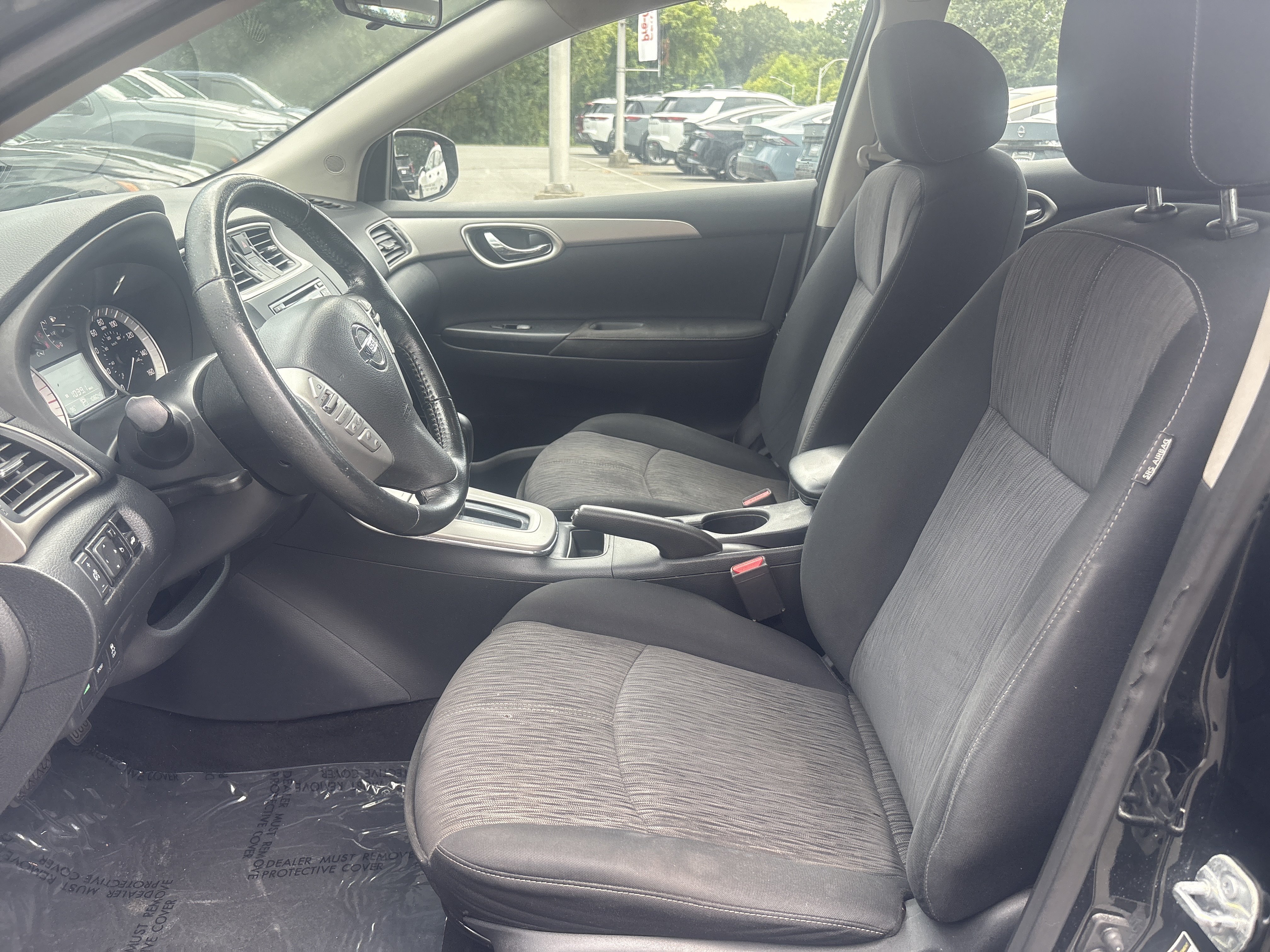 Used 2015 Super Black Nissan SV image 19