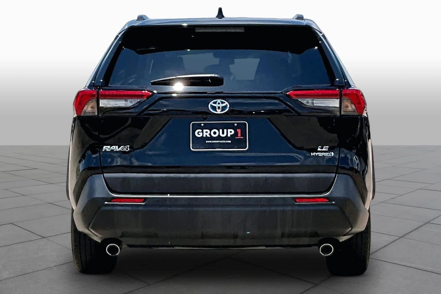 Used 2024 Midnight Black Metallic Toyota Hybrid LE image 5