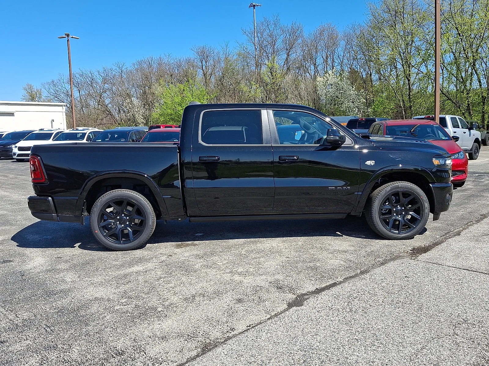 New 2026 Diamond Black Crystal Pearl-Coat Exterior Paint RAM Laramie image 9