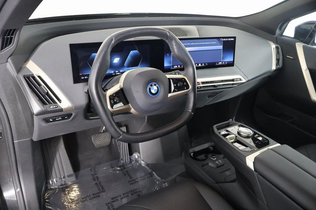 Certified Used 2024 Black Sapphire Metallic BMW xDrive50 image 7